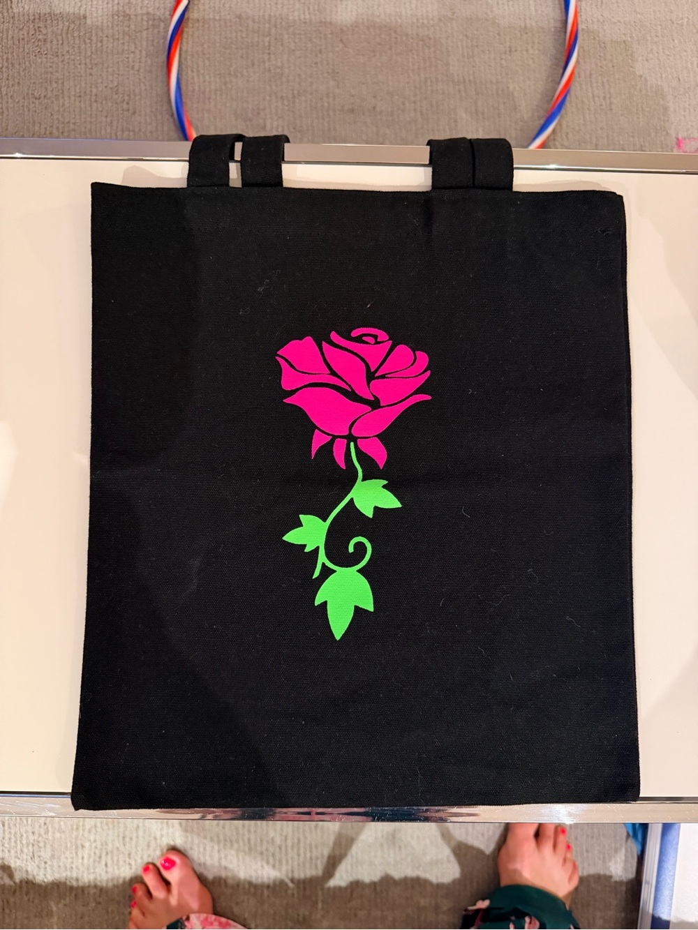 Black Tote with Hot Pink Rose and Bright Green Stem